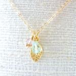 Leaf Charm Necklace in Gold..