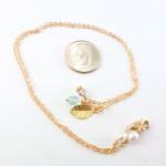 Leaf Charm Necklace in Gold..